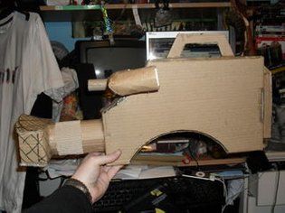 Cardboard Props: How to Make a Movie Camera: 14 Steps (with Pictures) Cardboard Camera, Cardboard Props, Make A Movie, Corrugated Packaging, Corrugated Card, Red Carpet Party, Chalkboard Drawings, Pen Craft, In Disbelief