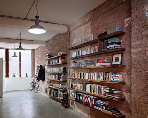 Shoreditch Warehouse Conversion by Chris Dyson Architects Steel Frame Doors, Modern Warehouse, Warehouse Conversion, Bookshelves In Bedroom, Modern Shed, Library Shelves, Exposed Brick Walls, Loft Living, Brick Walls