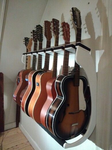 Even more guitar rack Guitar Rack Wall, Diy Guitar Rack, Guitar Display Ideas, Guitar Storage Ideas, Guitar Storage Cabinet, Guitar Storage, Guitar Display, Home Music Rooms, Guitar Rack