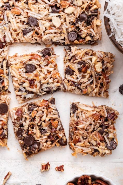 These chocolate coconut bars taste like a magic cookie bar but are easier to make with only 5 simple ingredients. They're crisp around the edges and have a nice chewy center. Magic Cookie Bar, Chocolate Coconut Bars, Blueberry Cheesecake Bars, Coconut Chocolate Bars, Eating Bird Food, Magic Cookie Bars, Delish Desserts, Coconut Chocolate, Coconut Bars