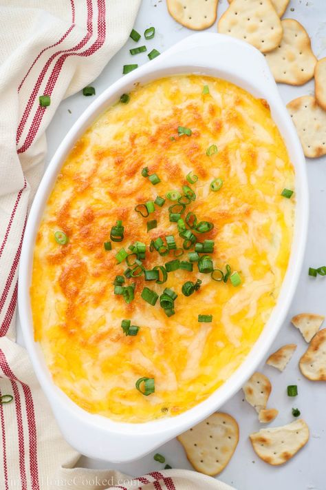 This Crab Artichoke Dip is bursting with flavor in every cheesy bite. The mix of three kinds of cheese with mouth-watering crab, tasty artichokes, and the perfect complement of seasonings will have everyone coming back for more. #crabartichokedip #crabartichokediprecipe #artichokecrabdip #dip Crab Dip Appetizers, Crab Artichoke Dip, Vidalia Onion Dip, Crispy Honey Chicken, Crab And Artichoke Dip, Cheeseburger Casserole Recipe, Orange Chicken Crock Pot, Dip Recipes Appetizers, Hot Crab Dip