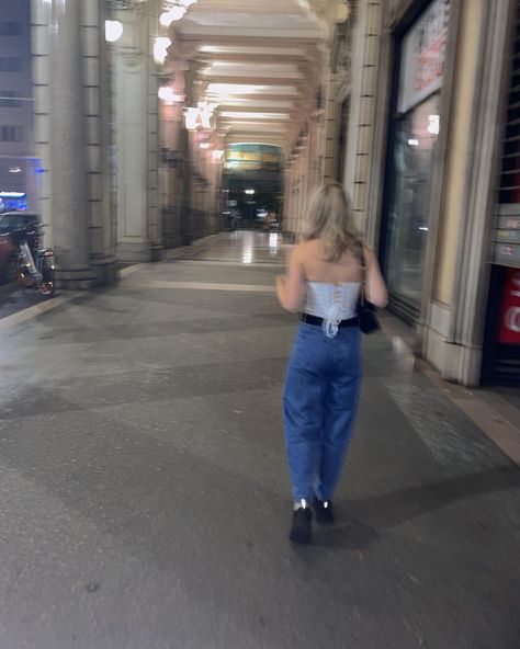 First picture blonde girl in the street, smiling, turning for the photo having a black Gucci handbag on her right shoulder, wearing a white laced corset with a black belt from Gucci and blue jeans. Mum style black shoes from Sheen head tilted to the left arm holding the bag on the right and arm hanging at the left second photo is Girl walking forward and you can see the back of the corset tied up with lace Autumn Outfit Aesthetic, Primark Boots, Primark Fashion, Corset Outfit, Outfit Aesthetic, Street Photo, Fall Photos, Autumn Outfit, Photoshoot Ideas