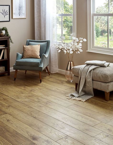 Impero - Addington Chestnut 10mm Laminate Flooring. 1.73m² Pack | DIY at B&Q Lounge Interior, Direct Wood Flooring, Lounge Interiors, Laminate Colours, Real Wood Floors, Valley Road, Spruce Up Your Home, Carpet Shops, Wood Shades