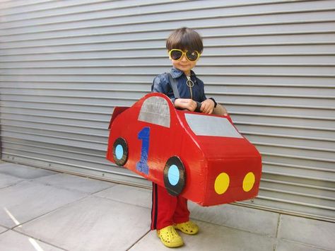 A fast and fun cardboard car costume easy to make with a couple cardboard boxes, red paint, and a hot glue gun. Cardboard Bus, Race Car Costume, Cars Halloween Costume, Diy Toys Car, Car Costume, Cardboard Box Car, Large Cardboard Boxes, Cardboard Car, Festa Hot Wheels