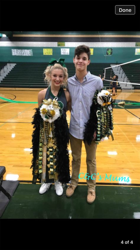 Hunter green and gold with gold accents Homecoming Mum and Garter. Made by C&C’s Floral Events Green And Gold Mums Homecoming, Garter Homecoming, School Mums, Texas Homecoming Mums, Homecoming Garter, Football Homecoming, Homecoming Mums Diy, Homecoming Ideas, Junior Year