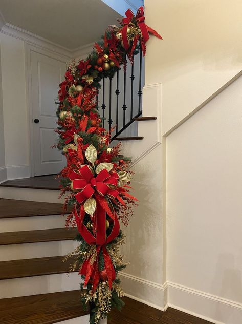 My client asked for a heavily decorated banister last Christmas to brighten up their entry way and that's exactly what I gave them. This specific area did not have a power source but with the glittered decor and shiny ball ornaments, we were able to bounce the light from the light fixtures in the entrance and the attached living room. Live Christmas Wreaths, Christmas Holly Decorations, Living Room Stairs, Christmas Banister, Christmas Stairs Decorations, Christmas Stairs, Holly Decorations, Christmas Staircase, Pretty Christmas Decorations