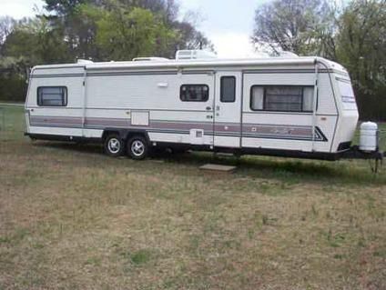 $5,950 1988 Holiday Rambler Aluma-lite 35ft travel trailer 35th Anniversary for sale in Cedartown, Georgia Classified | ShowMeTheAd.com Cool Rvs, Travel Trailer Living, Holiday Rambler, Trailer Life, Trailer Living, Old Race Cars, 35th Anniversary, Travel Trailer, Recreational Vehicles