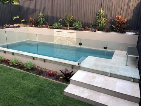 Step Up To Pool Area, Pool Into Hillside, Elevated Pool Landscaping, Small Raised Pools Backyard, Semi Above Ground Pool Deck Ideas, Pools On Sloped Yard, Steps To Above Ground Pool, Raised Pool Landscaping, Fiber Glass Pool Ideas