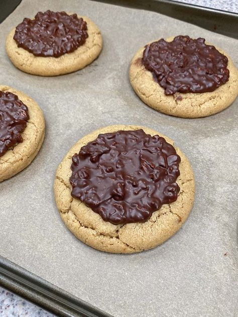 Ferrero Rocher Cookies | Ash Baber Ferrero Rocher Cookies Recipe, Ferrero Rocher Stuffed Cookies, Ferrero Rocher Macarons, Frerror Roche Chocolate, Forero Rocher Cake, Biscoff Cake, Triple Chocolate Cookies, How To Temper Chocolate, Cookie Dough Balls