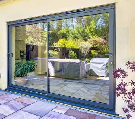 Upgrading Your View!
Let light flood into your home with our super stylish Anthracite Grey Aluminium Sliding Patio Doors! 
These stunning doors not only enhance the look of your home but also provide top-notch energy efficiency, security, and noise insulation.
Experience seamless indoor-outdoor living with our large garden patio openings, perfect for enjoying your garden all year round. 
#HomeImprovement #home #house #Surrey #Guildford #homedecor #Patiodoors #SlidingPatioDoors Aluminium Patio Doors, Slider Door, Building Contractors, Upvc Windows, Large Garden, Sliding Patio Doors, Double Glazed Window, Garden Doors, Double Glazing