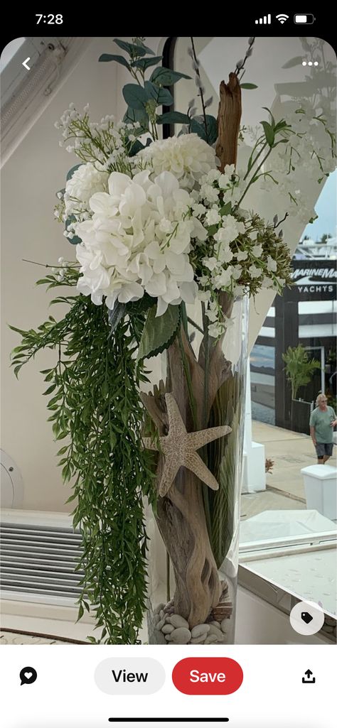 Tropical Vase Centerpiece, Sea Floral Arrangements, Tall Coastal Floral Arrangements, Beach Themed Floral Arrangements, Costal Wedding Centerpiece, Coastal Floral Arrangements Beach Themes, Coastal Floral Decor, Beach Theme Flower Arrangements, Coastal Flower Arrangements Beach Themes