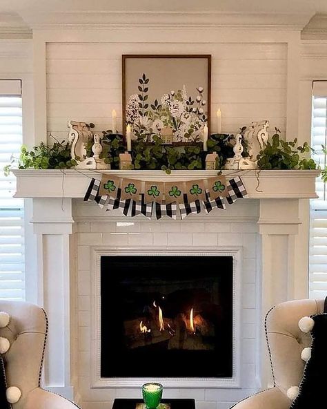 Here is another fireplace mantel for St. Patrick's Day! 🍀💚☘️ This awesome mantel was designed by @thehumblehaven  We are loving the black and white check, architectural corbels and the adorable tiny green houses! 😍💖😍 #thehumblehaven #stonemountaincastings #stonemountaincastingsfavs . . . . #stpatricksdaymantle #stpatricks #stpatricks2020 #stpatricksday2020 #mantledecor #manteldecor #springmantel #springmanteldecor #springhomedecor #springhome #springhomerefresh #springcottage #stylingmyseas Modern Fireplace Ideas, Mantel Styling, Couch Wall Decor, Patricks Day Decorations, Fireplace Garland, Holiday Bar, Rainbow Garland, White Fireplace, St Patrick's Day Decorations