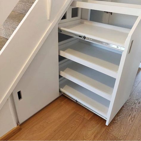 This minimalist under stair storage by SBT Designs uses Accuride drawer slides to create a pullout shoe storage rack, coat closet, and adjustable shelves. Visit our website for more under stair storage ideas! Keywords: Accuride, drawer slides, carpentry, diy, entryway, hallway, home decor, home interior, interior architecture, interior design, organization, smart storage, stairs storage, storage ideas, storage solutions, under stair storage, woodworking, woodworking plans, woodworking projects Shoe Racks Under Stairs, Shoe Rack Ideas Under Staircase, Pullout Shoe Rack, Shoe Cabinet Under Stairs, Under Stairs Shoes Storage, Shoes Storage Under Stairs, Under Staircase Drawers, Shoe Rack Under The Stairs, Shoe Rack Under Staircase