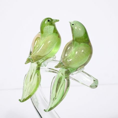 Mid-Century Chartreuse & Transparent Hand-Blown Murano Glass Bird Sculptures This playful and beautifully formed Pair of Mid-Century Modernist Hand-Blown Murano Glass Bird Sculptures in Chartreuse & Transparent Glass W/ 24K Gold Flecks originates from Italy, Circa 1960. They feature a transparent organic brach form base with substantial body and elegant curvatures, upon which rest two birds rendered in a striking hue of chartreuse with 24K Gold Flecks strewn throughout, referencing the natur... Panther Sculpture, Cherub Sculpture, Bird Sculptures, Design Motifs, Gold Flecks, Ceramic Animals, Two Birds, Bird Sculpture, Minimalism Interior