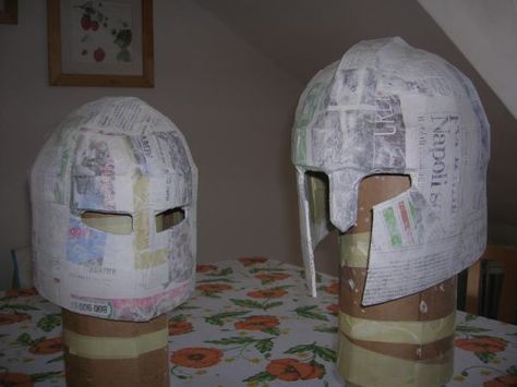 Making Paper Mache Helmets and Swords Paper Mache Projects, Paper Mache Mask, Making Paper Mache, Medieval Party, Samurai Helmet, Knight Costume, Knights Helmet, Paper Mache Art, Paper Mache Sculpture