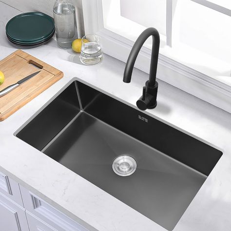 Featuring single bowl configuration in a drop-in installation format, this rectangular stainless steel kitchen sink combines fashion with function to create a contemporary look for the kitchen. Crafted from premium material for maximum durability, a deep sink accommodates glasses and barware with ease. The clean lines and special design complement every style preference, from traditional to transitional to modern. The corrosion-resistant surface is further protected from rust and oxidation by a meticulous finishing process. Commercial-grade satin finish and gently rounded corners make maintenance as simple as wiping the surface with a damp cloth.- Constructed from stainless steel for durability and reliability.- Includes waste, waste pipe and overflow. Black Stainless Sink, Big Kitchen Sink, Black Stainless Steel Sink, Stainless Steel Double Bowl Kitchen Sink, Kitchen Basin, Modern Kitchen Sinks, Black Kitchen Sink, Drop In Kitchen Sink, Kitchen Sink Design