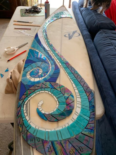 Stained glass mosaic of waves and sunshine still to come Mosaic Surfboard Ideas, Surf Mirror, Surfboard Mural, Surfboard Furniture, Surfboard Mosaic, Surfboard Art Decor, Mosaic Surfboards, Seaside Nursery, Waves Mural