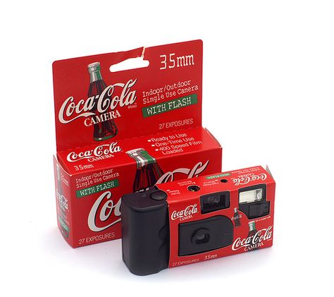 Coca Cola Disposable Camera - A disposable 35mm camera—manufacture unknown, but similar in design to Konica disposable cameras. Originally sold at Coca Cola bottling plant gift shops and the “World of Coke” in Atlanta, they later became readily available via web and mail order to Coke collectors worldwide. Disposable Film Camera, Disposable Cameras, Cute Camera, Plant Gift, Gift Shops, Disposable Camera, 35mm Camera, Camera Shop, Video Cameras