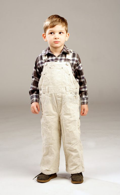 Young child. Standing and looking away , #Ad, #Young, #child, #Standing #ad Family Images, Man Standing, Stock Photography Free, Art Inspo, Overalls, Stock Images, Art, Design