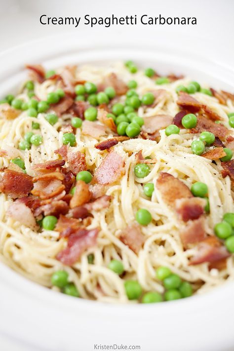 Creamy Spaghetti Carbonara is a super quick and easy meal. We love the cream sauce made with heavy whipping cream, with green peas, and bacon!! Easy family recipe. www.Capturing-Joy.com Spaghetti Carbonara With Peas, Peas And Bacon, Vegan Supper, Lunch Dishes, Spaghetti Carbonara Recipe, Creamy Spaghetti, Pasta Carbonara Recipe, Delicious Family Meals, Carbonara Recipe