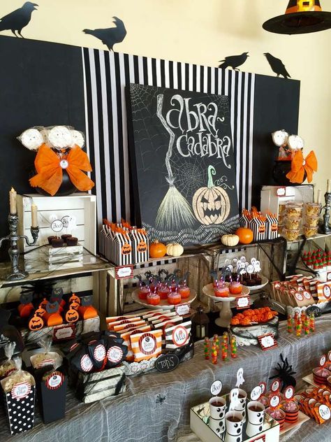 AbraCadabra! | CatchMyParty.com Halloween Dessert Table Decor, Halloween 60th Birthday Party, Halloween Office Party Decorations, Lds Halloween Ward Party, Hallowine Party Ideas, Halloween Desert Table, Halloween Candy Table Ideas, Halloween Dessert Table Ideas, Halloween Party Table Setup