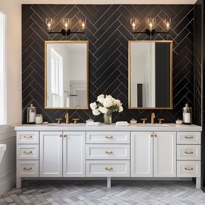 This 3-light bathroom lighting features a streamlined silhouette, which casts unique shadows on the wall when lighting, adding modern appeals to your room. The backplate connects curved arms in black finish, and at the end, three seeded glass shades are designed with an elegant touch and mid-century look. | Corrigan Studio® Daizjah 3 - Light Dimmable Vanity Light, Glass in Black | 10.2 H x 21.7 W x 6.9 D in | Wayfair Master Bath Black Fixtures, Black And Gold Hardware Bathroom, Black White And Gold Bathroom, Industrial Vanity Light, Powder Room Lighting, Cottage Remodel, Industrial Vanity, Black And Gold Bathroom, Brass Vanity Light