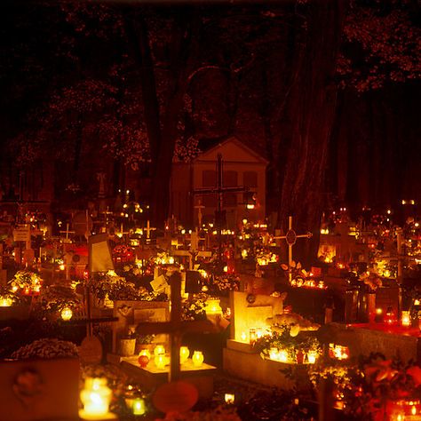 Rakowicki cemetery, Kraków 2003  The first of November is All Saints’ Day. This day the people in Poland are visiting a cemetery to remember their dead family members and/or dead friends. The days before the people are already busy to prepare All Saints. First they clean and fix the graves, after that they put some flowers and candles on it. Saints Days, All Souls Day, All Saints Day, All Souls, Can Lights, Samhain, Krakow, Memento Mori, Hallows Eve