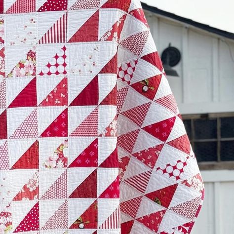 Julia Davis | Modern Barn Quilts on Instagram: "Have you ever made a red and white quilt? If not, you most definitely should! What makes a quilt like this just so good is the scrappy factor. So I’m planning a “red fabric square swap” in January for anyone who wants to join! (More details to come later) I made this quilt 10 years ago when I was just learning to quilt. I pieced and quilted it on a tiny 3/4-size #Bernina sewing machine that I bought when I graduated from high school. And this quilt is still in my top 5 favorite quilts today. It was simple to make - I used 5” squares that I sewed into HST’s, and then trimmed down to 4.5” (making a 4” finished block). I finished this at 80”x80” - I couldn’t handle quilting anything bigger than that on my little machine. But I think it w Red And White Christmas Quilt, Red And White Quilts Patterns, Red And White Quilts Patterns Free, Julia Davis, Triangle Quilt Pattern, Two Color Quilts, Christmas Quilting, Bernina Sewing Machine, White Quilts