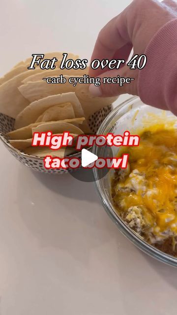 Gina Wynn | Fat loss over 40 on Instagram: "In my 6 week program, we carb cycle. This means we have lower carb days to make sure we are really dipping into our fat storage, and higher carb days to fuel our workouts and balance our hormones.  This high protein taco bowl is perfect for low carb days.  6 ounces lean ground turkey seasoned with taco spices 1/2 cup cottage cheese 1/2 cup shredded cheese 2 low carb tortillas (I used mission)  Spray two low carb tortillas with olive oil. Cut into triangular pieces and bake at 350 for 10 min.  Layer your bowl with meat, cottage cheese, and shredded cheese. Microwave for 60-80 seconds.  Macros for entire recipe: 14 net carbs 25 fats 78 proteins  Enjoy!" Protein Taco Bowl, High Protein Taco Bowl, Taco Keto, Taco Spices, Ground Turkey Seasoning, Accountability Coach, Ww Appetizers, Carb Cycle, Low Sugar Diet Recipes