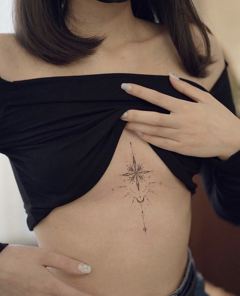 Tattoo Designs Chest Female, Star Tattoos Sternum, Small Tattoo Sternum, Celestial Underbust Tattoo, Sternum Tats For Women, Compass Tattoo Sternum, North Star Chest Tattoo, Underbust Tattoos For Women, Chest Bone Tattoo Female