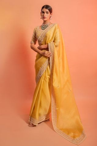 10326074PRICEIN Haldi Outfit, Indian Designer Sarees, Indian Sarees Online, Embroidered Crop Tops, Yellow Saree, Designer Sarees Online, Saree Trends, Embellished Blouse, Fancy Blouses