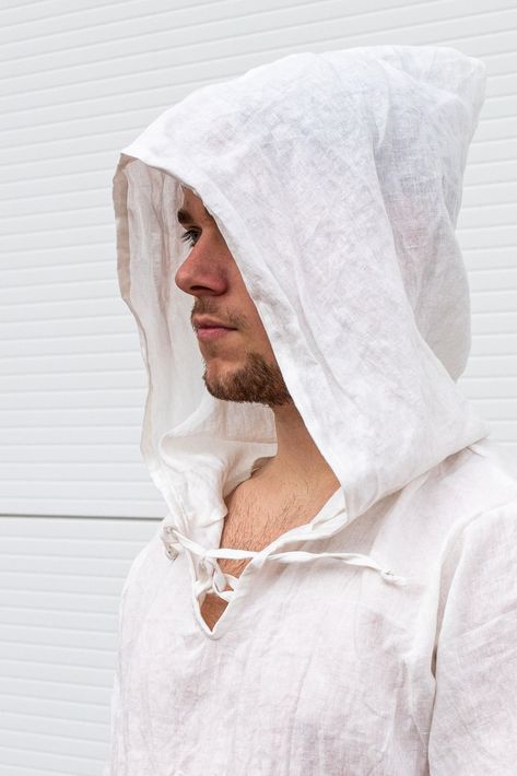 "White Linen Hoodie Shirt, Men Gauze Hoodie, Hooded Top Express Shipping to the USA, Fedex Courier for free Delivery 3-5 Business Days Linen tunic with a large pointed hood made of Polish 100% linen, additionally softened for better comfort of wearing, by softening the linen it is very nice and soft to the touch :) Loose cut and naturalness of the fabric is- what is most important for our comfort of wearing such tunic not only in the summer, it will work at any time of year, linen and workmanshi Dune Clothing, Linen Clothes For Men, Medieval Shirt, Cyberpunk Clothing, Cyberpunk Clothes, White Shirt Men, Medieval Clothing, Short Sleeve Hoodie, Hooded Top