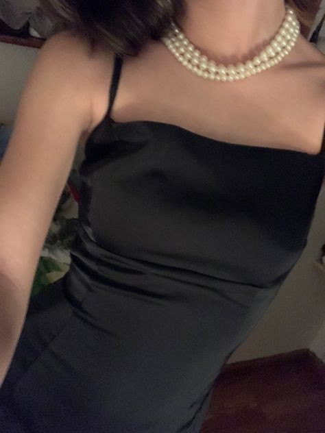 Black Dress Prom Silk, Black Speggetti Strap Dress, Silk Black Dress Aesthetic, Black Iconic Dress, Pearls Black Dress, Pearl Necklace With Black Dress, Black Dress Straps, Black Classy Dress Aesthetic, Black Mini Dress Outfit Aesthetic