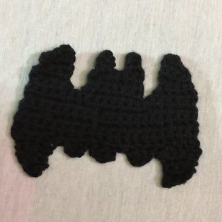 How to Crochet a Mini Version of the Batman Logo - Instructables The Batman Logo, Crochet Blanket Yarn, Crochet Batman, Crochet Baby Socks, Baby Batman, Baby Hat Sizes, Yellow Yarn, Easy Crochet Patterns Free, Crochet Amigurumi Free Patterns