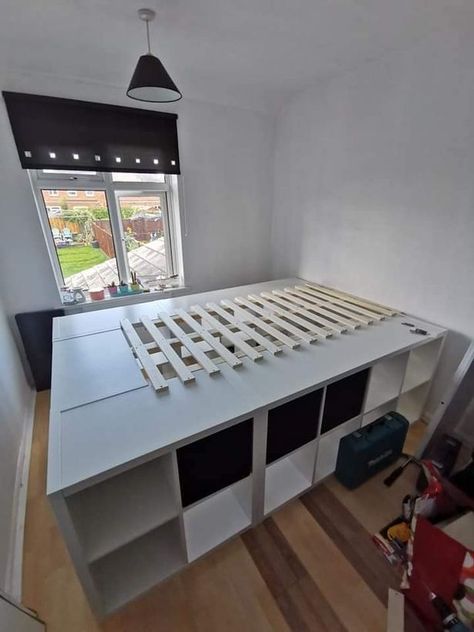 Mum shares incredible DIY Ikea bed hack that doubles storage space in her tiny box room - Daily Record Ikea Bed Jack, King Size Kallax Bed, Double Bed Storage Ideas, Tiny Room Double Bed, Ikea Cube Bed, Raised Double Bed With Storage, Box Room Double Bed Ideas, Small Double Bed With Storage, Space Saving Double Bed