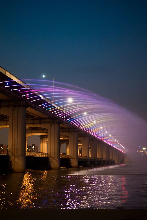 The Banpo Bridge Rainbow Fountain is the world’s longest bridge fountain and is synchronized to music, set to go off about three times a day... Banpo Bridge, Seoul Travel, South Korea Seoul, South Korea Travel, Korea Travel, Seoul Korea, A Bridge, Beautiful Places To Visit, Dream Destinations