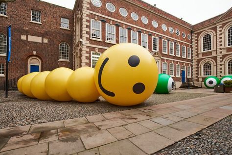 The team at Glow was delighted to be asked once again to produce a collection of inflatable artworks for artist Bruce Asbestos. His newly commissioned work is currently on display in the courtyard at the Bluecoat in Liverpool and is inspired by the iconic building’s architectural features. The collection includes a giant yellow smiling worm representing Rest, an oversized cartoon-like arm representing Connection and Classical Facade, Liverpool Uk, Giant Inflatable, History Painting, The Courtyard, Iconic Buildings, Blue Coats, High Art, Architectural Features