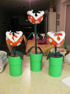 Instructions on how to make Piranha Plant Centerpieces for Super Mario Themed Birthday Party Mario Decorations, Super Mario Piranha Plant, Mario Piranha Plant, Super Mario Brothers Party, Princess Peach Party, Mario Kart Party, Mario Crafts, Nintendo Party, Plant Centerpieces