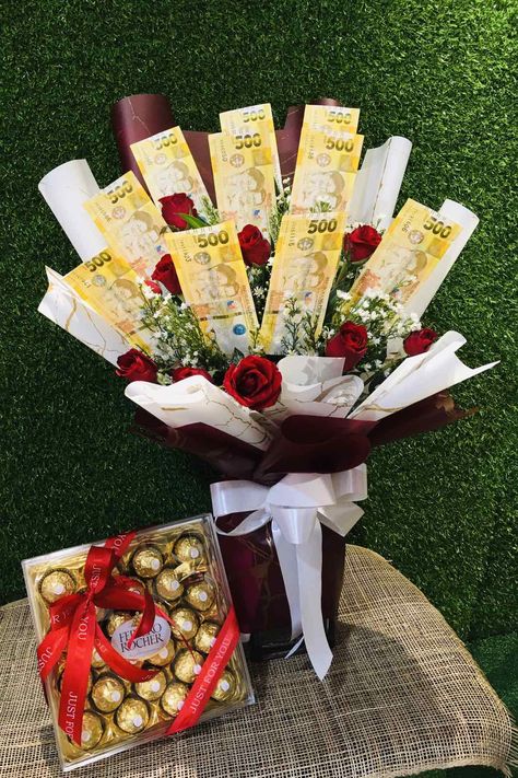 Looking for the perfect Father's Day gift for your dad in the Philippines? Send him a delightful surprise with a unique and practical present - a money bouquet with chocolates! Show your love and appreciation by combining the thoughtful gesture of a money bouquet with the sweet indulgence of chocolates. It's the best Father's Day gift idea that will bring a smile to his face. Explore more exciting gift options at www.cebuflower.com. #FathersDayGifts #MoneyBouquet #Chocolates #Philippines Money Bouquet Philippine Peso, Money Bouquet With Chocolate, Flower Bouquet Money, Dad Bouquet, Money Hamper, Money Bouquet With Roses, Bouquet With Money, Money Bouquet Aesthetic, Bouquet With Chocolates