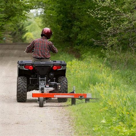 DR Trimmer/Mower (Tow-Behind) Hitch our All-Terrain model to your ATV (or UTV) and take care of all your rough area trimming and mowing. Great for fence lines, trails, ditches, and more. Quick-Lock Trimmer Head makes cord changes fast and easy. #drpower #trimmer Atv Implements, Atv Attachments, Towing Vehicle, Utility Tractor, Tractor Attachments, Underground Bunker, Atv Riding, Riding Lawn Mowers, 4 Wheeler