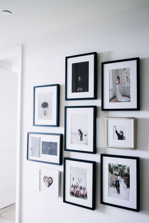 Styling A Chic Photo Wall | The Skinny Confidential Wedding Pictures Display, Wedding Photo Wall Display, Wedding Gallery Wall, Wedding Picture Walls, Picture Display Wall, Wedding Photo Walls, Wedding Photo Display, Photo Wall Display, Framed Wedding Photos