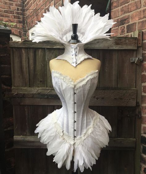 Jennifer on Instagram: “My fingers are shredded from the hand sewing, but the white feather collar finally has the matching corset! #white #WhiteSwan #feather…” Feather Corset, Angel Dresses, Feather Collar, Tulle Long Skirt, White Peacock, Angel Dress, White Corset, White Feather, Halloween 2024