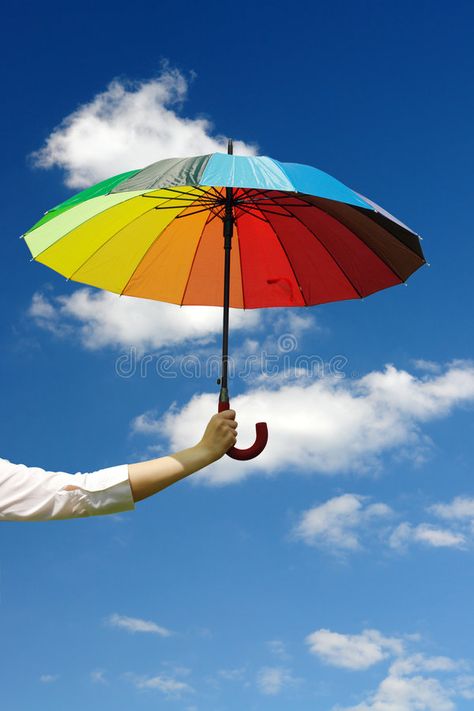 Sunny umbrella. Female hand holding multicolored umbrella against the sunny sky , #AFFILIATE, #Female, #hand, #Sunny, #umbrella, #sunny #ad Hand Holding Umbrella, Colourful Clouds, I Wish You More, Holding Umbrella, Umbrella Photo, Sunny Sky, 1 Samuel, Fitness Logo, Hand Holding