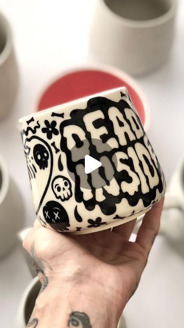 ✨💗Ugli Mug Ceramics💗✨ on Instagram: "One of my favorite pieces from the May batch, and still applicable 😵 I will be tying up some loose ends on the Halloween release this week, and afterwards, there are still two firings to go! What are you getting into? 👻🪦👻 . . . . . . . . . . . . . . . . . . . #mugshotmonday #mug #mugs #pottery #ceramics #ceramic #potterylove #handmade #functionalart #handmadeart #handpainted #underglaze #stoneware #collectibles #weirdart #spoopy #spookyseason #halloween #goth #gothaesthetic #gothgoth #gothstyle #gothart #darkart #darkarts #ghost #emo #emostyle" Halloween Pottery Ideas Painted, Goth Pottery Painting, Diy Mug Painting, Underglaze Mug, Halloween Pottery Painting, Harry Potter Ceramics, Halloween Pottery Ideas, Emo Painting, Ceramic Gift Ideas