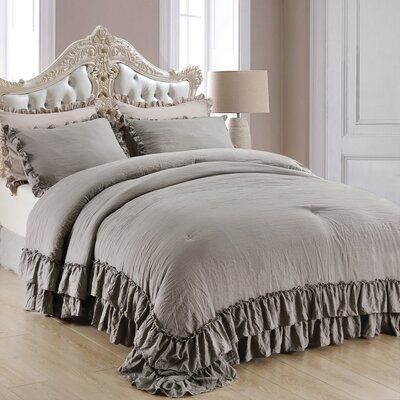 Brighten up your master suite and bring a touch of feminine style to your abode with this bedding set! it’s crafted from ultra-soft and cozy stone washes polyester and filled with a polyfill for warmth and comfort. Beautiful flowing ruffles, in a hue, add charming appeal to the shabby farmhouse comforter. It fits seamlessly into many decor themes, including farmhouse, coastal, shabby elegance, French country, minimalist, hygge and more. Color: Gray, Size: Queen Comforter + 2 Standard Shams | Ros Boho Chic Bedding, Taupe Bedding, Ruffle Comforter, Fluffy Comforter, King Size Comforter Sets, Grey Comforter, King Size Comforters, Bedding Comforter, Chic Bedding