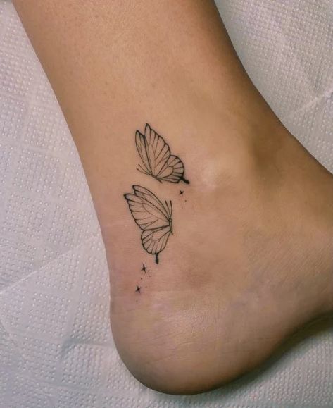 100+ Butterfly Tattoo Meanings Designs and Ideas – neartattoos Where To Put Butterfly Tattoo, Simple Butterfly Flower Tattoo, Tony Butterfly Tattoo, Flock Of Butterflies Tattoo, Flying Butterfly Tattoo Designs, Butterflies Tattoo Forearm, Now She Flies With Butterflies Tattoo, Small Flying Butterfly Tattoo, Dotwork Butterfly Tattoo