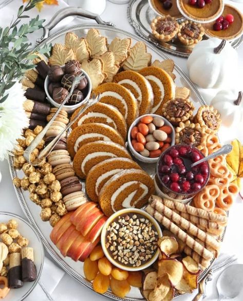 Get ready for a taste of fall with these Thanksgiving dessert board ideas! Mini pies, pumpkin-shaped chocolates, maple cookies, and charming turkeys in autumnal colors create a delightful spread. Feast your eyes on Heather Baird's sweet board from Sprinkle Bakes, radiating serious autumn vibes. And yes, we're definitely claiming all the Pumpkin Spice cake – thank you very much! Thanksgiving Dessert Charcuterie, Traditional Holiday Desserts, Dried Apple Chips, Thanksgiving Hacks, Dessert Boards, Party Boards, Dessert Charcuterie Board, Dessert Charcuterie, Thanksgiving 2023