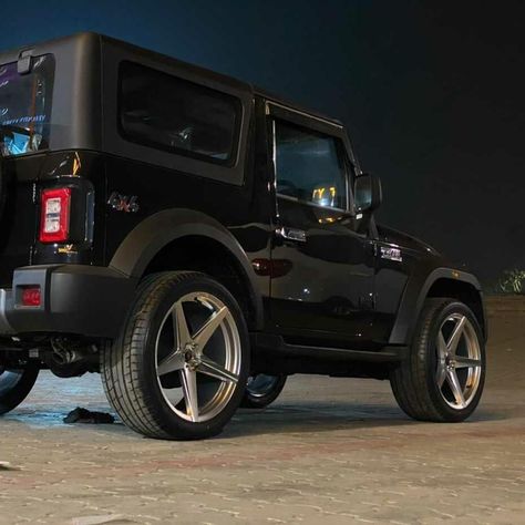 2,795 Likes, 19 Comments - S H I V A (@tatsexyboy) on Instagram: “Guess the size ? Mahindra Thar 2020 with New Alloy wheels 🔥 Tag & follow 📸@jeeplife_india . . .…” Black Thar, Mahindra Thar Jeep, Maruti Suzuki Jimny, New Mahindra Thar, Mahindra Jeep, Car Photos Hd, Indian Cars, Jeep Wallpaper, Accessories List