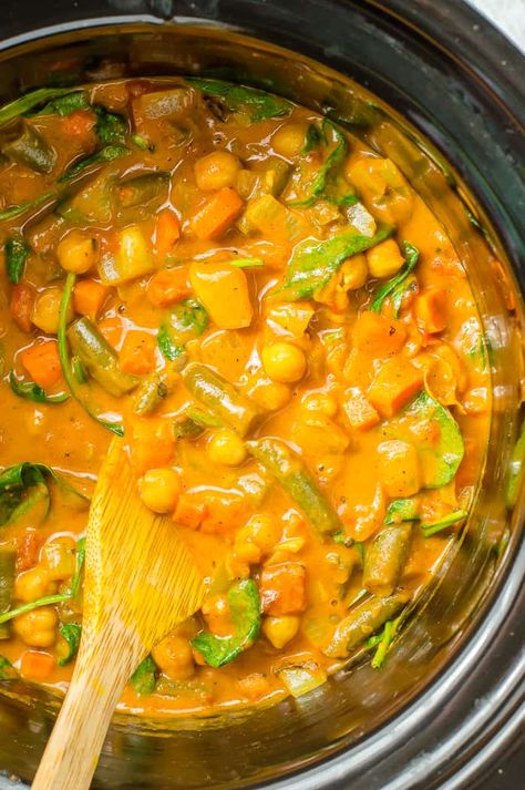 This slow cooker vegetable curry is flavorful, satisfying, and loaded with 5 different veggies and protein from chickpeas. Easy to make in your crockpot, this healthy vegetarian dinner is the perfect way to end a busy day. Slow Cooker Recipe Vegetarian, Chickpea Curry Crockpot, Crockpot Curry Vegetarian, Slow Cooker Chickpea Recipes, Crockpot Meals Vegetarian, Vegetable Stew Crockpot, One Pot Meals Vegetarian, Slow Cooker Vegetarian Recipes, Slow Cooker Chickpea Curry