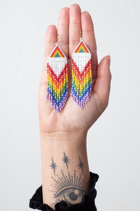 Rainbow beaded earrings, big, long, chandelier style Matte white with all the colors of the rainbow,  red, orange, yellow, green, blue, and purple  Handmade jewelry with  MIYUKI Delica seed beads  which are made in Japan  Light weight earrings   Hypoallergenic hooks  Gold dipped hooks Same day or next day shipping free shipping from California IG: @wildjoyjewelry Rainbow Beaded Fringe Earrings, Rainbow Fringe Earrings, Bird Ears, Long Chandelier, Bead Loom Designs, Earrings Colorful, Long Fringe, Rainbow Beads, Earrings Bohemian